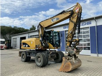 Grävmaskin på däck CAT M316D Mobilbagger *12.600 h *Hammerleitung