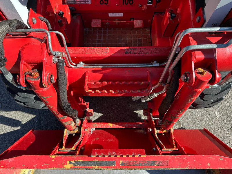 Kompakt bandlastare Case 1825 4x4 KOMPAKT / UNILADER mit Schaufel / Gabel