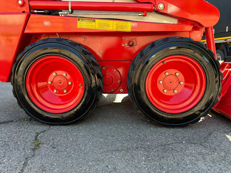Kompakt bandlastare Case 1825 4x4 KOMPAKT / UNILADER mit Schaufel / Gabel
