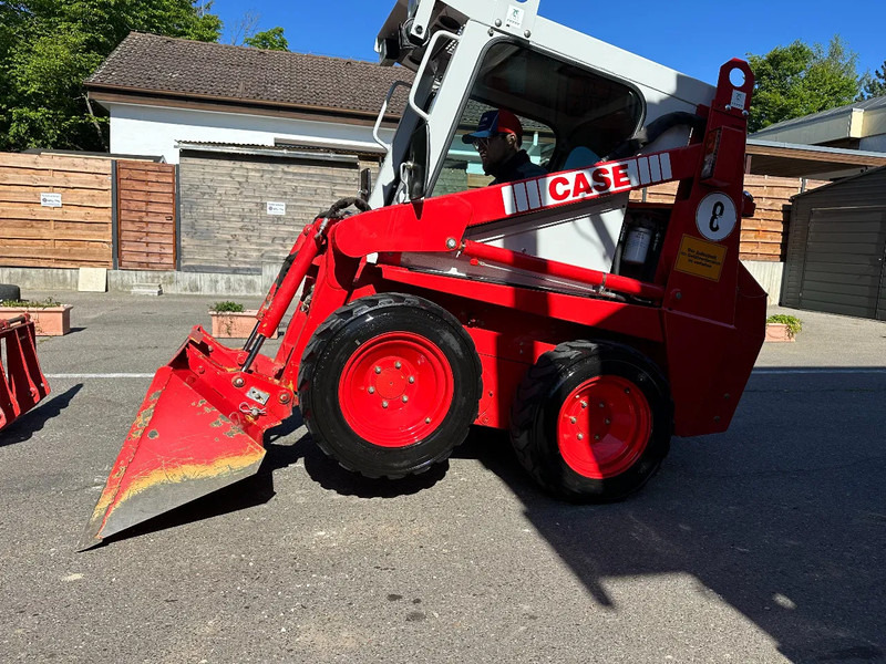 Kompakt bandlastare Case 1825 4x4 KOMPAKT / UNILADER mit Schaufel / Gabel