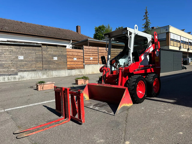 Kompakt bandlastare Case 1825 4x4 KOMPAKT / UNILADER mit Schaufel / Gabel