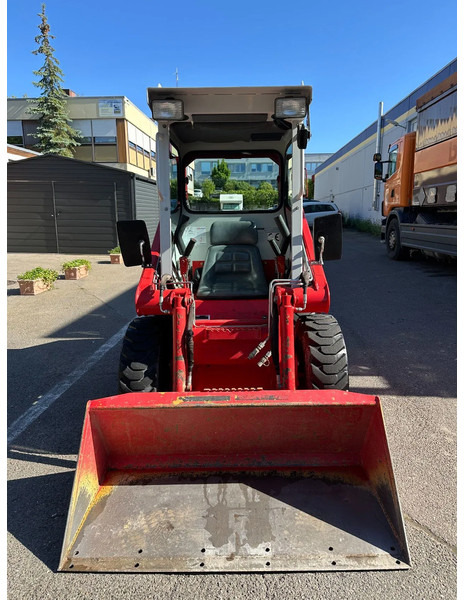 Kompakt bandlastare Case 1825 4x4 KOMPAKT / UNILADER mit Schaufel / Gabel