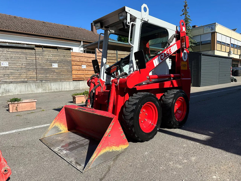 Kompakt bandlastare Case 1825 4x4 KOMPAKT / UNILADER mit Schaufel / Gabel