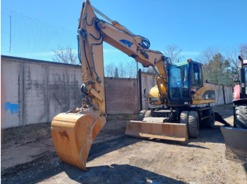 Grävmaskin på däck CATERPILLAR M315C