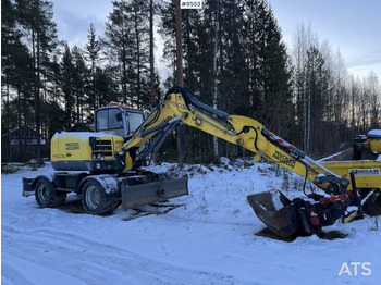 Grävmaskin på däck WACKER