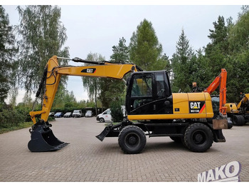 Grävmaskin på däck CATERPILLAR M313D