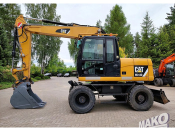 Grävmaskin på däck CATERPILLAR M313D
