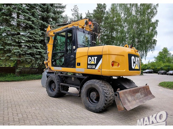 Grävmaskin på däck Caterpillar M313D: bild 2