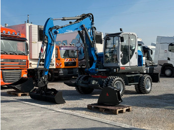 Grävmaskin på däck WACKER