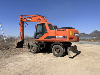 Grävmaskin på däck DOOSAN
