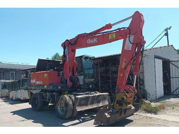 Grävmaskin på däck O&K