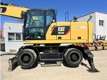 Grävmaskin på däck Caterpillar M 320 F (111527): bild 2