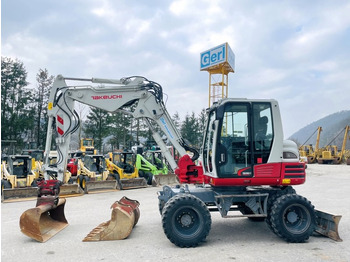 Grävmaskin på däck TAKEUCHI