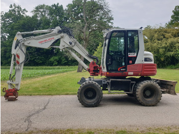Grävmaskin på däck TAKEUCHI