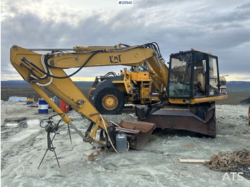 Grävmaskin på däck CATERPILLAR 312