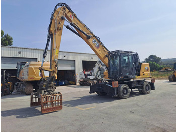 Grävmaskin på däck CATERPILLAR MH3024