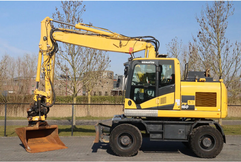 Komatsu PW160-11 | ENGCON TILTROTATOR | BUCKET | TRAILER HYDR. - Grävmaskin på däck: bild 1 Komatsu PW160-11 | ENGCON TILTROTATOR | BUCKET | TRAILER HYDR. - Grävmaskin på däck: bild 1