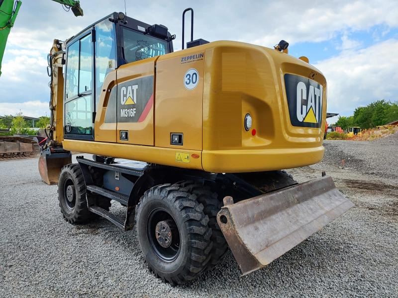 Caterpillar M316F - Grävmaskin på däck: bild 1 Caterpillar M316F - Grävmaskin på däck: bild 1