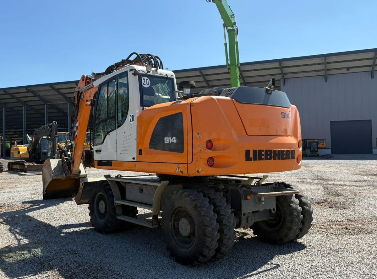 Liebherr A914 - Grävmaskin på däck: bild 1 Liebherr A914 - Grävmaskin på däck: bild 1