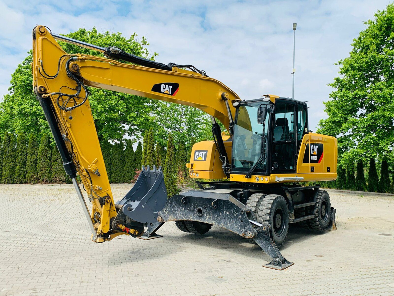 CAT M318F Mobilbagger *5.845 h *Schnellwechsel - Grävmaskin på däck: bild 1 CAT M318F Mobilbagger *5.845 h *Schnellwechsel - Grävmaskin på däck: bild 1