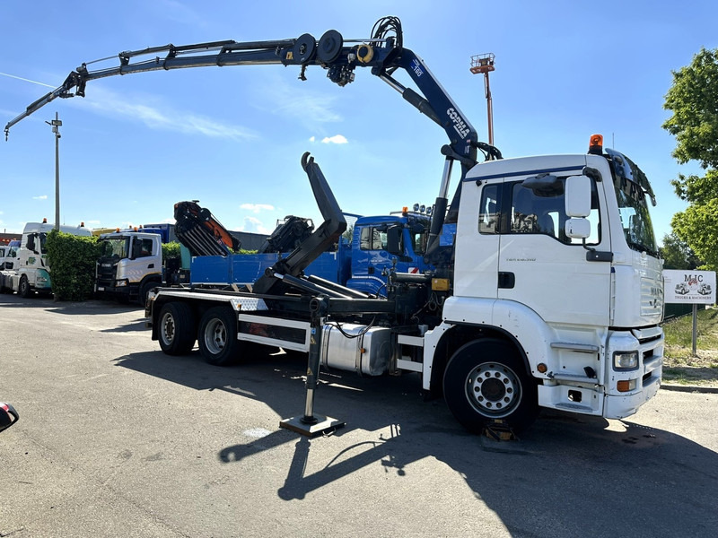 MAN TGA 26.310 6X2 HOOKLIFT + CRANE COPMA 160.4 + JIB J2 + WINCH - RADIO - LIFT + STEERING AXLE - EURO 3 - BE - Lastväxlare lastbil, Kranbil: bild 1 MAN TGA 26.310 6X2 HOOKLIFT + CRANE COPMA 160.4 + JIB J2 + WINCH - RADIO - LIFT + STEERING AXLE - EURO 3 - BE - Lastväxlare lastbil, Kranbil: bild 1