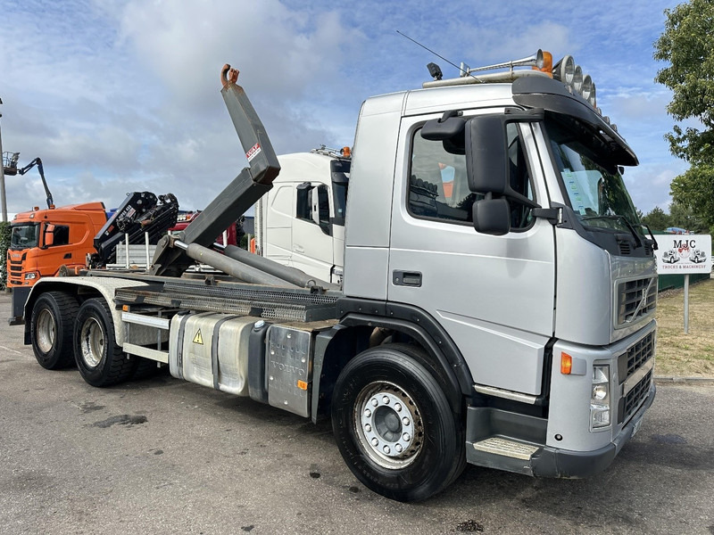 Volvo FM 400 6x4 HOOKLIFT / HAAKARM WAF 20T - EURO 5 - MANUAL - BLADVERING / STEEL SUSPENSION - TÜV 02/2026 - BE TRUCK - Lastväxlare lastbil: bild 1 Volvo FM 400 6x4 HOOKLIFT / HAAKARM WAF 20T - EURO 5 - MANUAL - BLADVERING / STEEL SUSPENSION - TÜV 02/2026 - BE TRUCK - Lastväxlare lastbil: bild 1