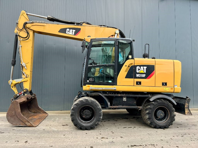 Cat M318F - Grävmaskin på däck: bild 2 Cat M318F - Grävmaskin på däck: bild 2