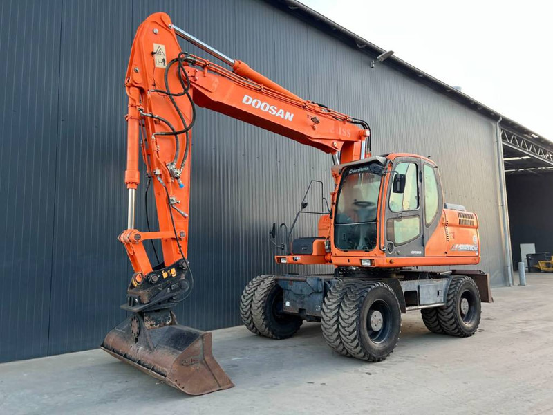 Doosan DX 170 W - Grävmaskin på däck: bild 1 Doosan DX 170 W - Grävmaskin på däck: bild 1