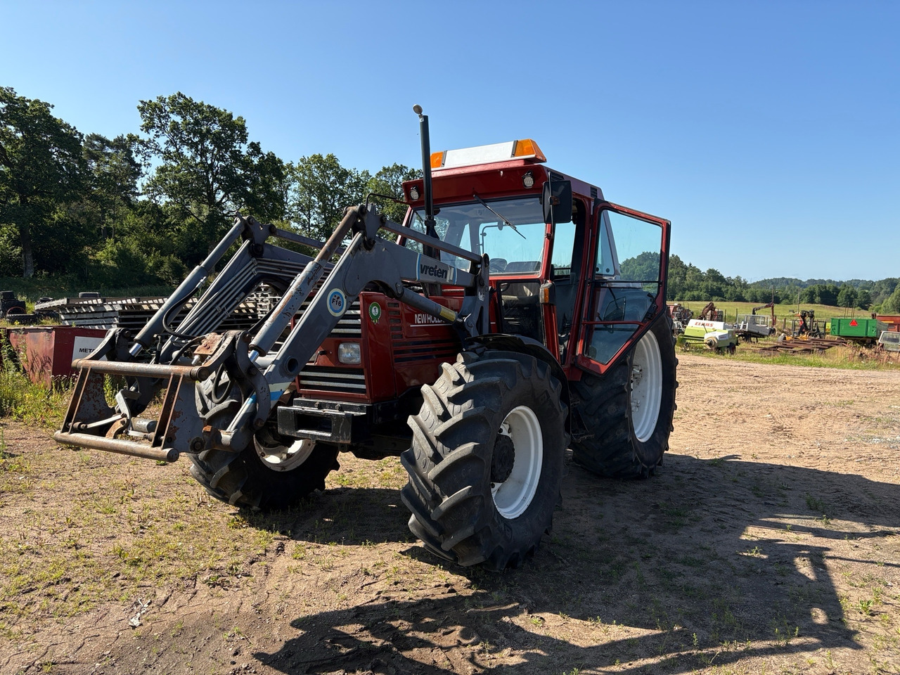 New Holland 110-90 - Traktor: bild 1 New Holland 110-90 - Traktor: bild 1