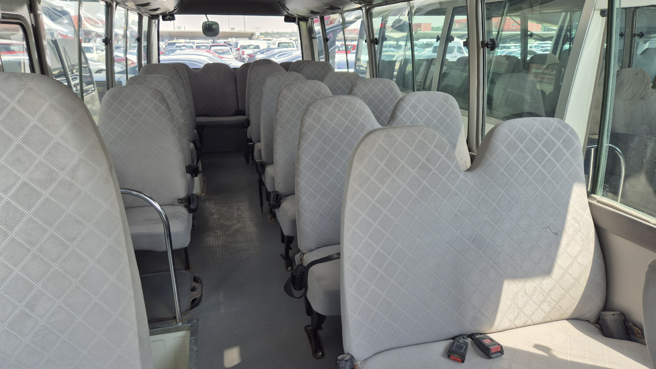 TOYOTA Coaster ... 30 places ... Climatisé - Minibuss, Persontransport: bild 3 TOYOTA Coaster ... 30 places ... Climatisé - Minibuss, Persontransport: bild 3