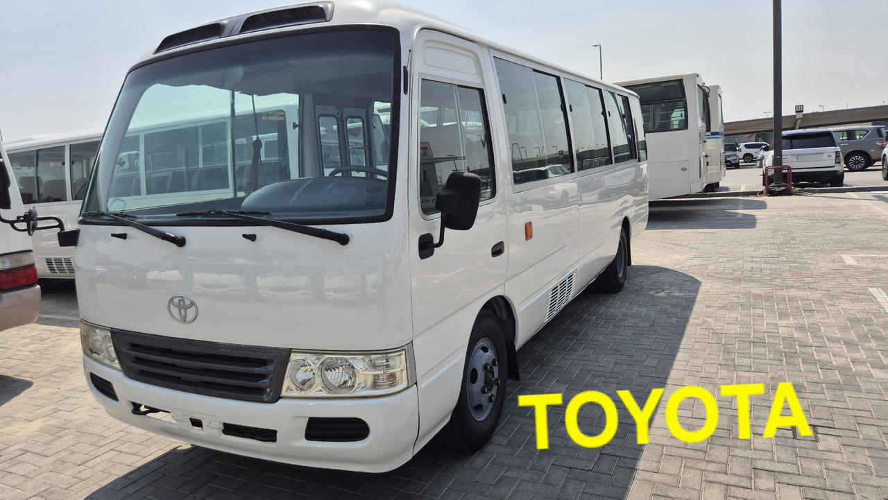 TOYOTA Coaster ... 30 places - Climatisé - Minibuss, Persontransport: bild 1 TOYOTA Coaster ... 30 places - Climatisé - Minibuss, Persontransport: bild 1
