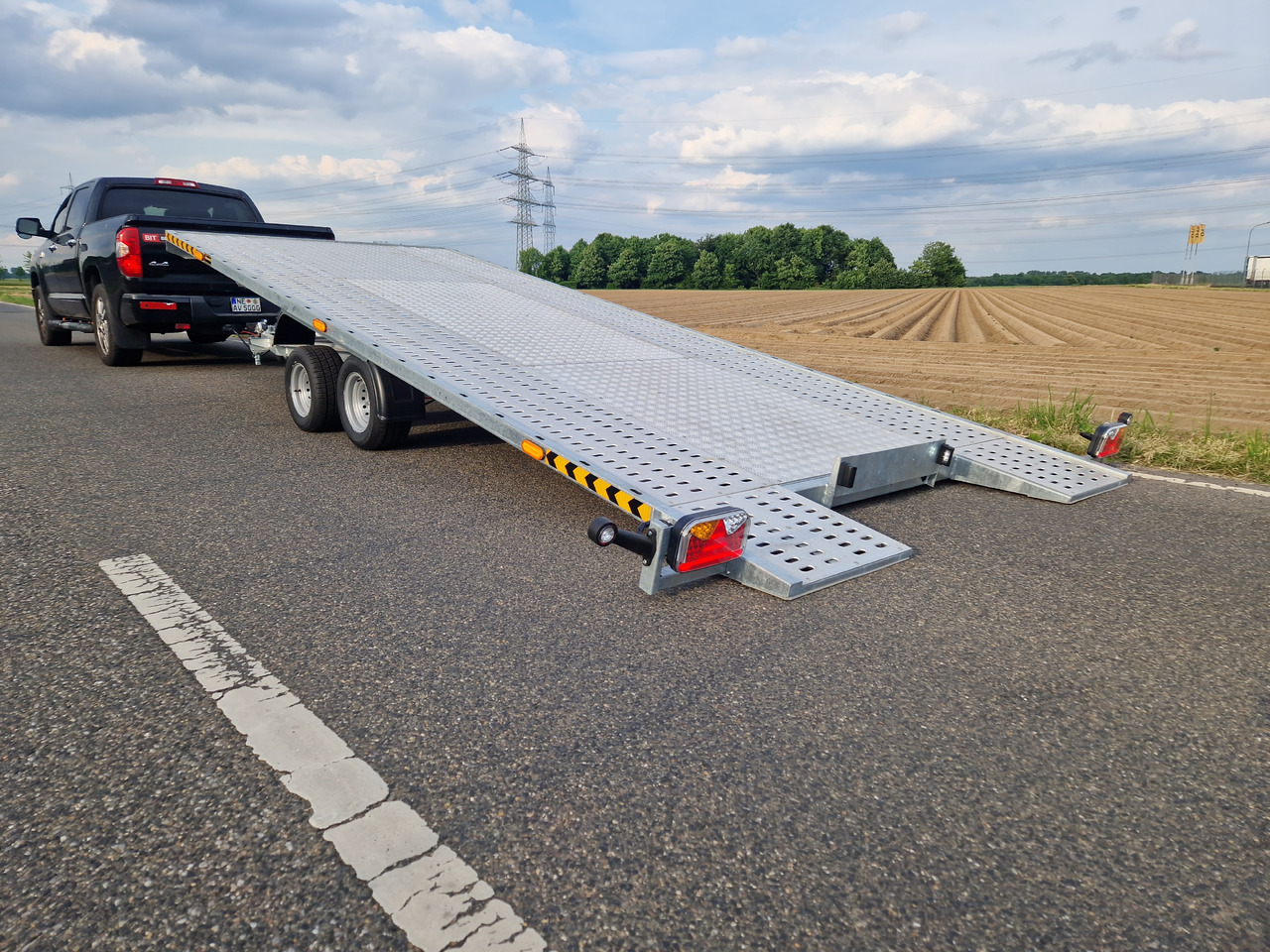 Cartrailer Expert 3050 easyload black 500x216cm Boden ankippbar Winde Resrad 10" 3000kg 100km/H - Biltransportsläp: bild 1 Cartrailer Expert 3050 easyload black 500x216cm Boden ankippbar Winde Resrad 10" 3000kg 100km/H - Biltransportsläp: bild 1