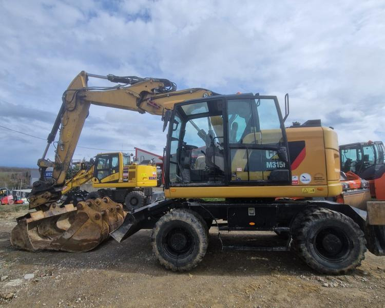 Caterpillar M315F F - Grävmaskin på däck: bild 1 Caterpillar M315F F - Grävmaskin på däck: bild 1
