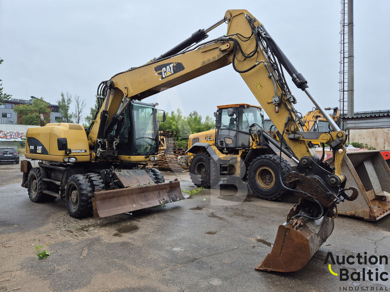 Caterpillar M 315 D - Grävmaskin på däck: bild 2 Caterpillar M 315 D - Grävmaskin på däck: bild 2