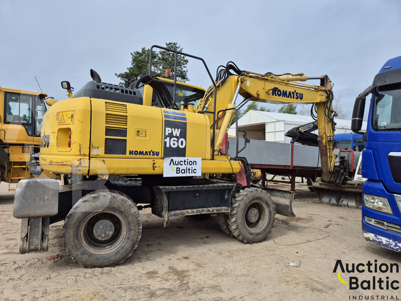 Komatsu PW160 - Grävmaskin på däck: bild 1 Komatsu PW160 - Grävmaskin på däck: bild 1