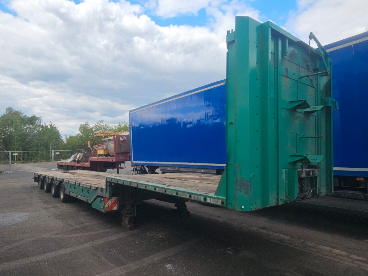 Meusburger MPG-4 Tieflader mit Radmulden 39.5t - Låg lastare semitrailer: bild 2 Meusburger MPG-4 Tieflader mit Radmulden 39.5t - Låg lastare semitrailer: bild 2