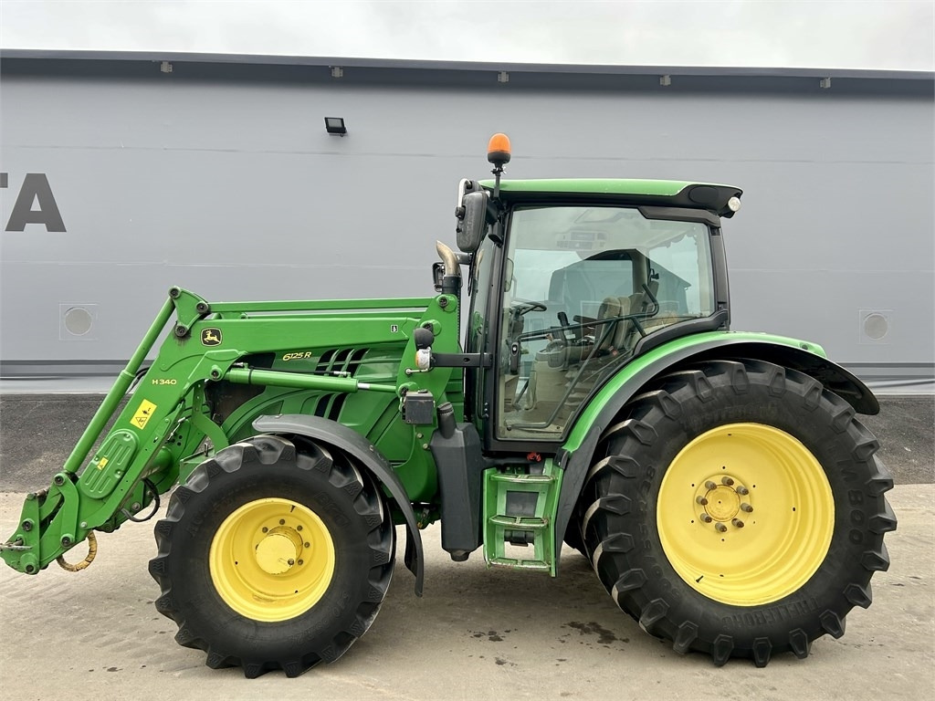 John Deere 6125 R AUTOPOWER ETUKUORMAAJALLA - Traktor: bild 1 John Deere 6125 R AUTOPOWER ETUKUORMAAJALLA - Traktor: bild 1