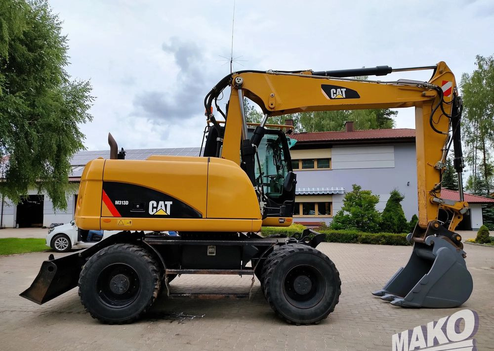 Caterpillar M313D - Grävmaskin på däck: bild 5 Caterpillar M313D - Grävmaskin på däck: bild 5