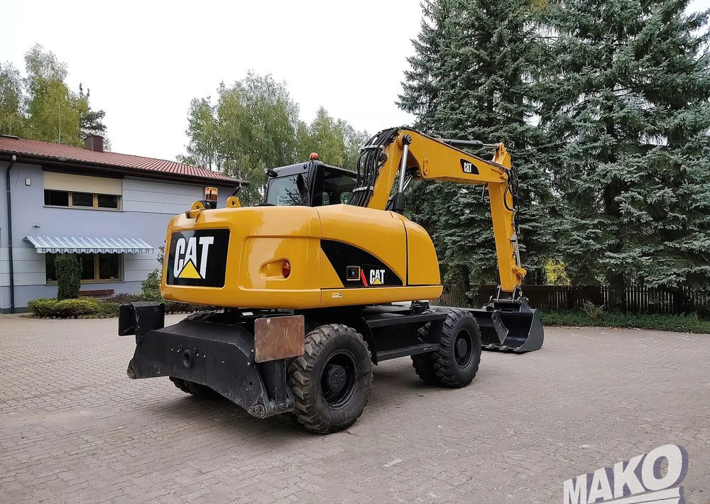 Caterpillar M313D - Grävmaskin på däck: bild 4 Caterpillar M313D - Grävmaskin på däck: bild 4