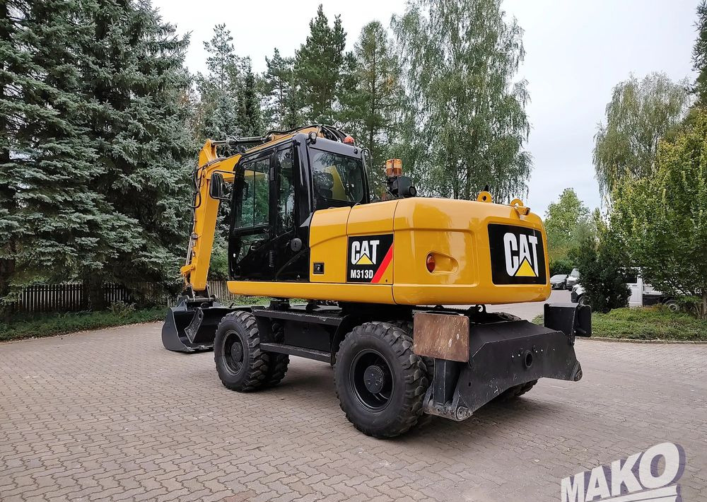 Caterpillar M313D - Grävmaskin på däck: bild 2 Caterpillar M313D - Grävmaskin på däck: bild 2