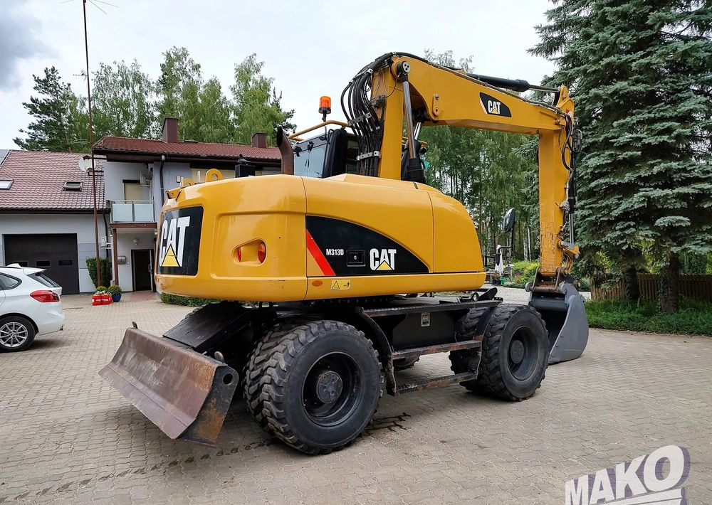Caterpillar M313D - Grävmaskin på däck: bild 4 Caterpillar M313D - Grävmaskin på däck: bild 4