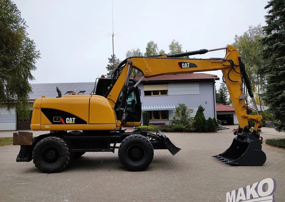 Caterpillar M313D - Grävmaskin på däck: bild 5 Caterpillar M313D - Grävmaskin på däck: bild 5