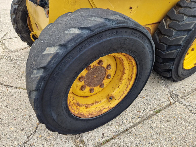 Kompaktlastare/ Slirstyrda lastare Caterpillar 216B3 schranklader met 1191 uur: bild 11