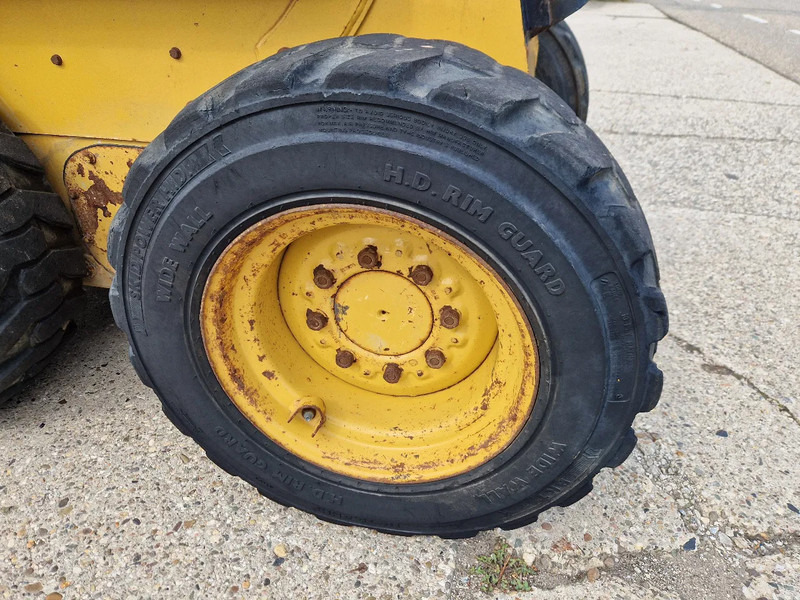 Kompaktlastare/ Slirstyrda lastare Caterpillar 216B3 schranklader met 1191 uur: bild 10