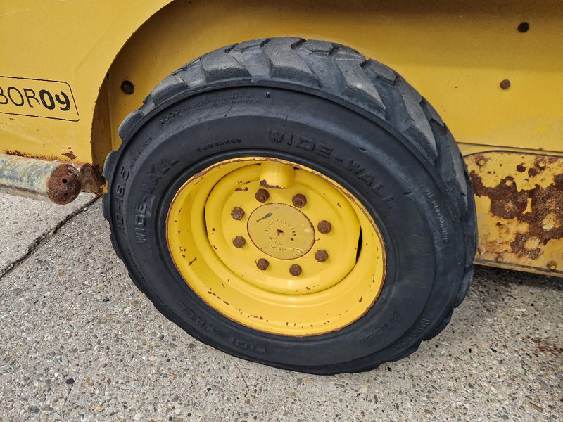 Kompaktlastare/ Slirstyrda lastare Caterpillar 216B3 schranklader met 1191 uur: bild 12