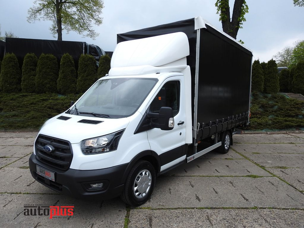 Ford TRANSIT PRITSCHE PLANE 8 PALLETS AUFZUG A/C - Transportbil med kapell: bild 1 Ford TRANSIT PRITSCHE PLANE 8 PALLETS AUFZUG A/C - Transportbil med kapell: bild 1