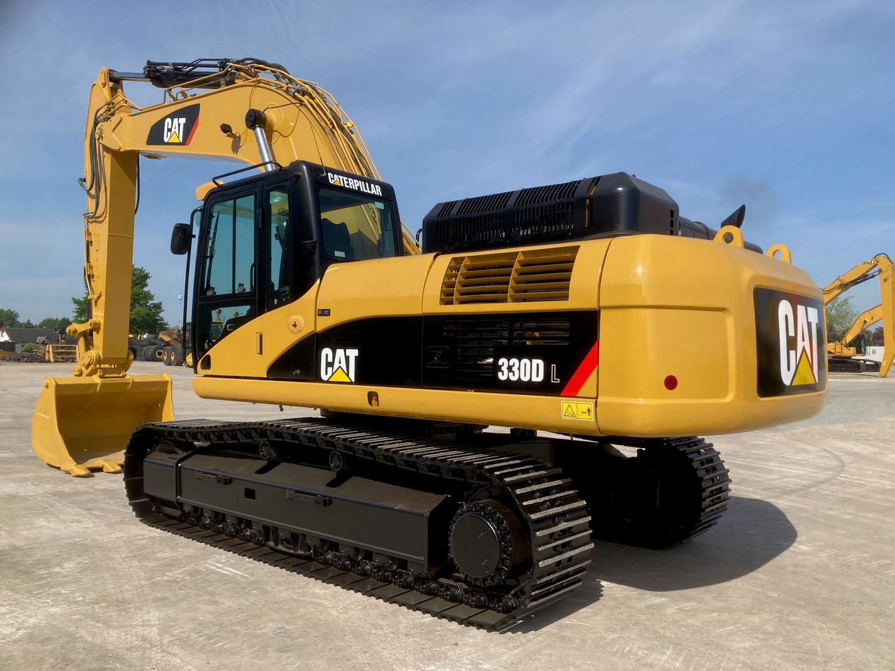 Caterpillar 330DL - Bandgrävare: bild 1 Caterpillar 330DL - Bandgrävare: bild 1