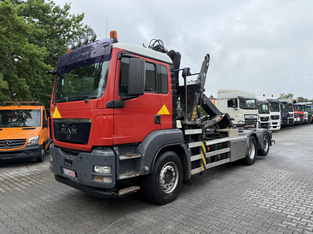 MAN TGS 26.360 6X2 Haken mit Kran HMF 1643Z - Lastväxlare lastbil, Kranbil: bild 1 MAN TGS 26.360 6X2 Haken mit Kran HMF 1643Z - Lastväxlare lastbil, Kranbil: bild 1