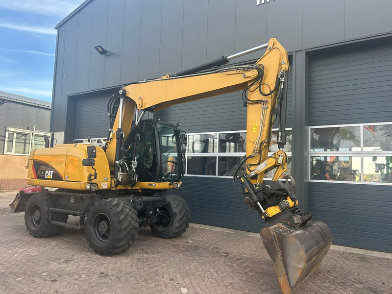 Caterpillar M313D - Grävmaskin på däck: bild 3 Caterpillar M313D - Grävmaskin på däck: bild 3