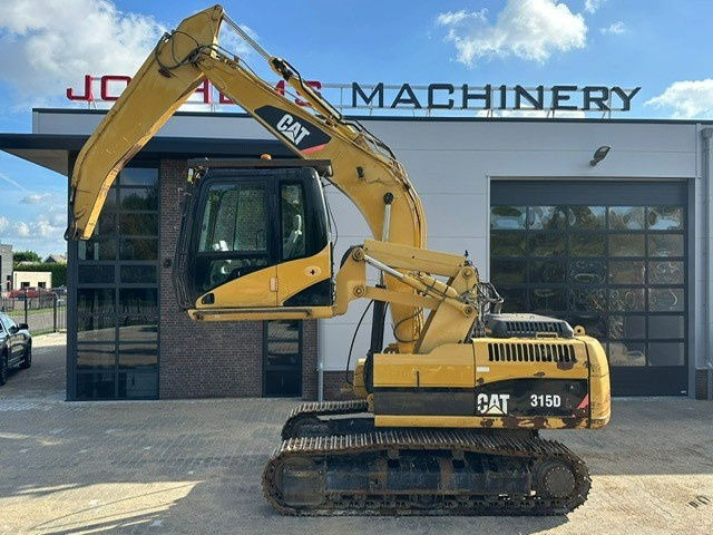 Caterpillar 315DL Material Handler - Bandgrävare: bild 1 Caterpillar 315DL Material Handler - Bandgrävare: bild 1